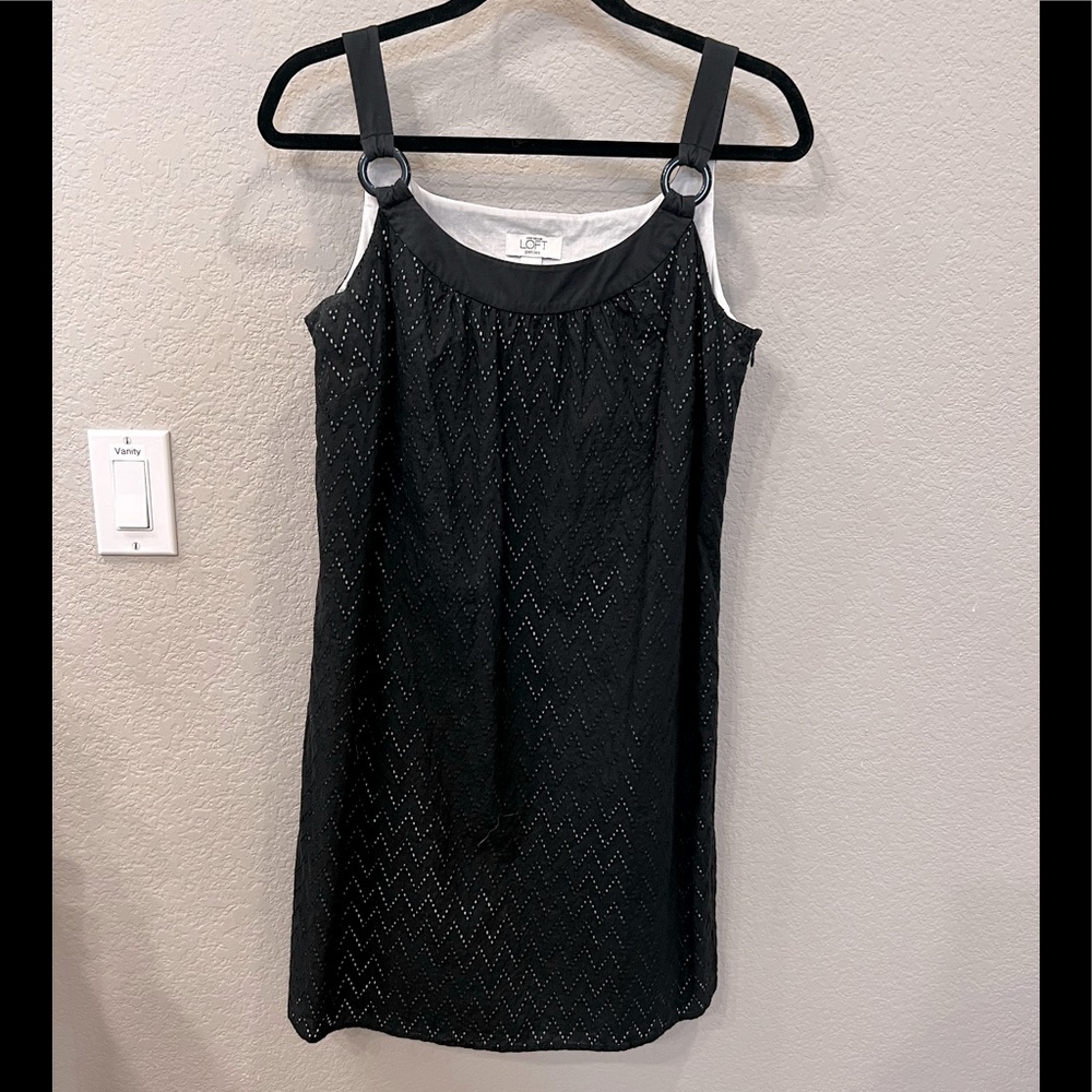 Cute black eye lit dress, fully lined, size 10 petite